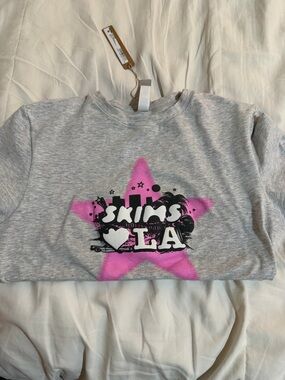 Gray Graphic Tee with Pink Star and Black Logo